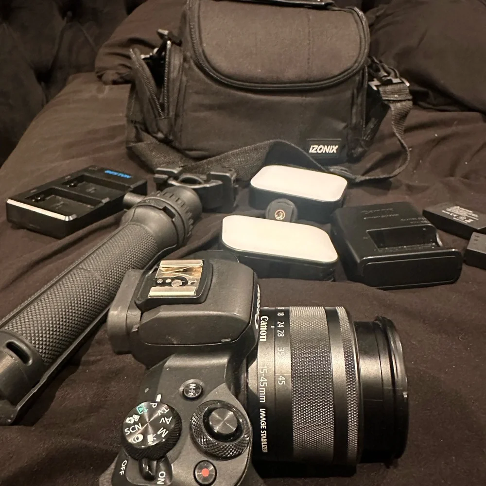 Canon M50 Camera + Tripod, Camera Bag, Lighting, Extra Batteries & Chargers